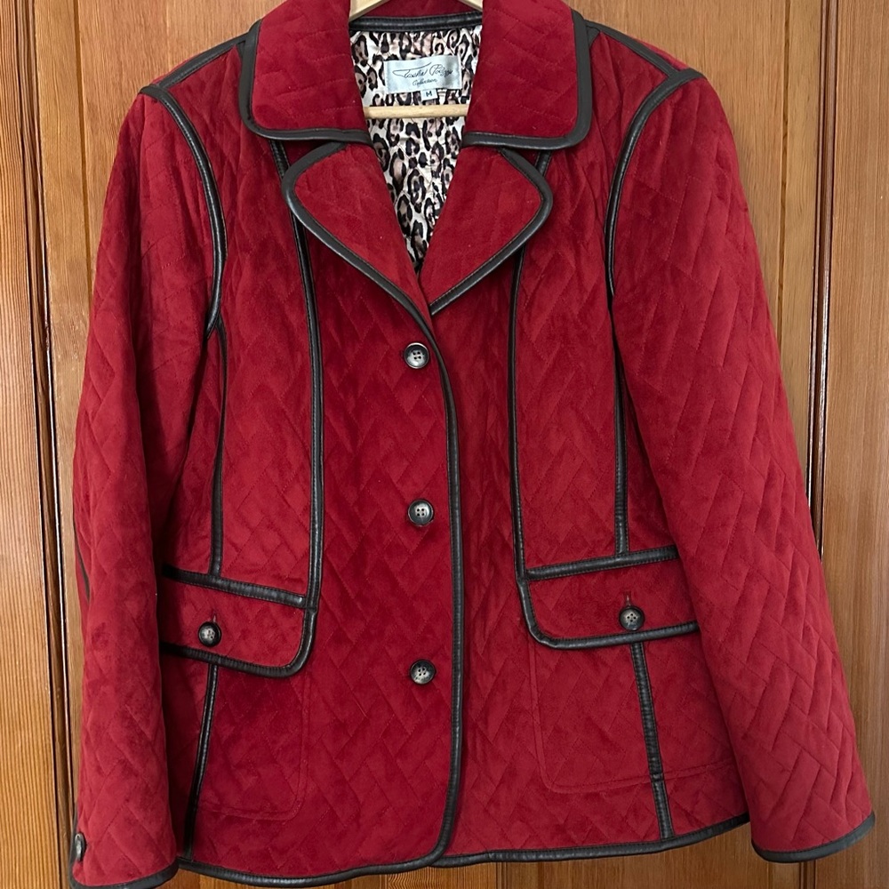 Red Jacket with brown trim and leopard trim lining. Size Medium, but runs large.